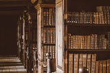 The corridor of an old library.