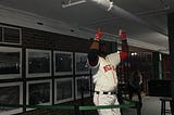 The Lego recreation of David Ortiz illuminates behind the grandstand on the night of the Red Sox’s…