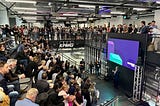 The stage of Platform Calgary surrounded by a large crowd of spectators.