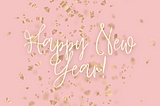 Gold confetti on a pink background with white script reading Happy New Year!