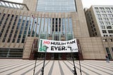 Preparation for protest against the Trump Muslim travel ban, Minneapolis, MN — c.2018. Wikimedia Commons