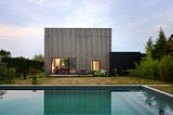 Timber-framed “bioclimatic” house with larch cladding by Tectoniques