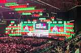 Photo of the Web Summit main stage with a full audience in attendance.