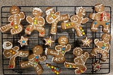 Ninja-styled cookies with writing themes cooling on a rack.