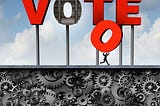 A small dark figure steals the “O” from a large red sign that says VOTE.