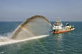 an ocean dredger excavating emotions from seabeds