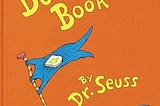 The butter battle book by Dr. Seuss. A character holding a flag with an image of bread with butter.