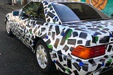 Ethan Lipsitz hand painted 1991 Mercedes Benz 500sl in 80s graphic style