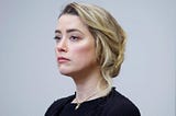 Amber Heard won’t see your tweets mocking her, but survivors of sexual violence like me will
