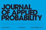 Journal of Applied Probability -kansilehti sinisellä taustavärillä ja mustalla tekstillä.