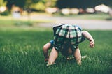 A kid bent over.