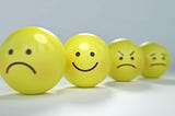 smiley faces for anger, happiness and rudeness