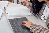 A woman working on a computer