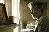 A man pauses while sorting his late father’s belongings and studies an old family photograph, realizing there was more to his father than the story he had always believed.