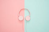 headphones pink on one side and green on the other