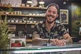 Happy cannabis shop budtender