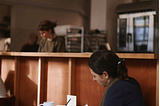 Sample image of a lady sitting in a cafe
