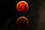 Beautiful image of 3 red moons in the night sky.