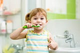 How I got my five year old to brush her teeth and learn programming in the process