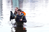 UBC students sampling water in Lost Lagoon.