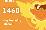 Image of the Duolingo mascot with the caption ‘I’m on a 1460 day learning streak!’