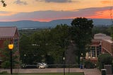Sunset and mountains in the background with trees and school buildings in the foreground, McCallie School, Chattanooga, Tennessee