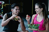 People enjoying food after working out