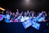 Students cheering for a special guest.