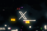 An white X on a black background with some glitches spread.