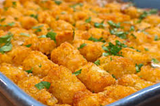 Indulge in Irresistible Comfort Food: Beef Tips and Tater Tots