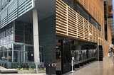 The exterior and interior of the lobby of the Grand Library of Montreal