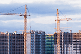 High Rise Building construction and tall cranes