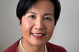 Portrait of Helen Huang, Australian author known for her debut political thriller novel ‘Nuclear Power Nuclear Game.’ Helen is depicted with a thoughtful expression, symbolizing her deep engagement with complex themes in her writing. She is recognized for her unique storytelling and significant contributions to the political thriller genre as a female author.
