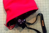 Turn an Old Hoodie into a Great Camera Bag for Travel