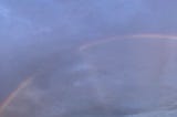 A rainbow at the beach.