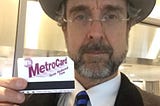 The author approaching 66, with his senior discount subway fare card.