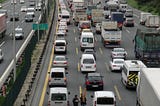 Congested Cities and the Unavoidable Commute Time