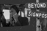 A still from the Twilight Zone episode “Where Is Everbody?” showing Earl Holliman in a payphone booth. Next to the still is a street signpost bearing the title “Beyond The Signpost”