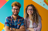 two smiling coworkers in front of a colorful background