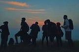 Family, friends and the partner waiting for the sunrise