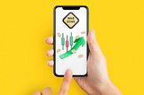 Person holding an iPhone with a profit arrow going up under a sign which says war zone