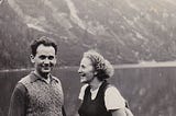 A young couple hiking in the Polish mountains poses beside lake in 1939.