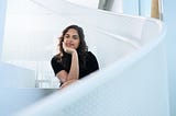 Woman sitting on staircase