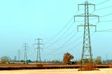 Electricity pylons in open country