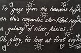 The handwritten words to the poem, entitled Kisses of Silver — by Carolyn Hastings 2020. Silver text on black paper.