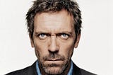 Dr. House stares sternly