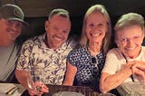 Family photo of Gregory J. Hoag, his siblings, and his mom.