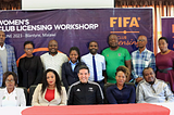 Eskalasi standar bagi klub dan liga domestik menuju profesionalisasi melalui program Club Licensing dari FIFA Women’s Football Development Programme. Digelar di Malawi dan Zambia pada Jumat (23/06) dan Selasa (27/06) tahun lalu, lokakarya ini mengakomodasi pendanaan, perlengkapan, serta memantapkan struktur kelembagaan liga guna menciptakan kompetisi yang berlisensi dan layak. Terlihat penyelenggara dan peserta tengah berpose bersama. Sumber gambar: Laman resmi FIFA