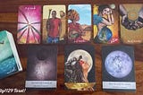 The spread for the collective reading includes five tarot cards and one bottom deck card and three oracle cards. Do head to the main article for an in-depth reading.