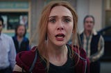 Wanda Maximoff looks on horrified in the town square during the WandaVision season finale